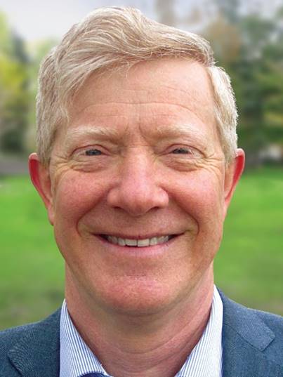 A person smiling for the camera
Description automatically generated with medium confidence